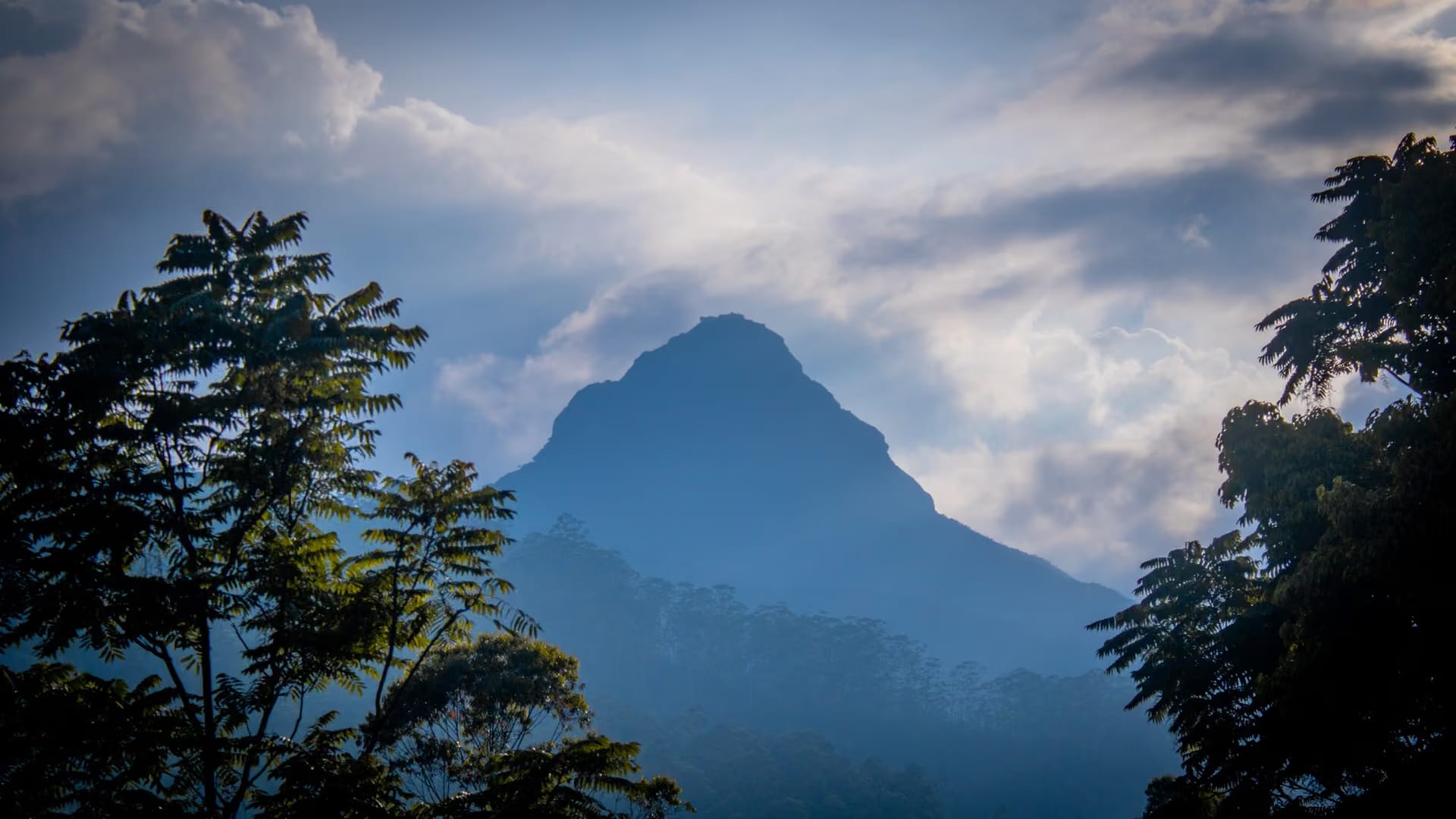 Adam's Peak (Sri Pada) sacred mountain silhouette in Sri Lanka